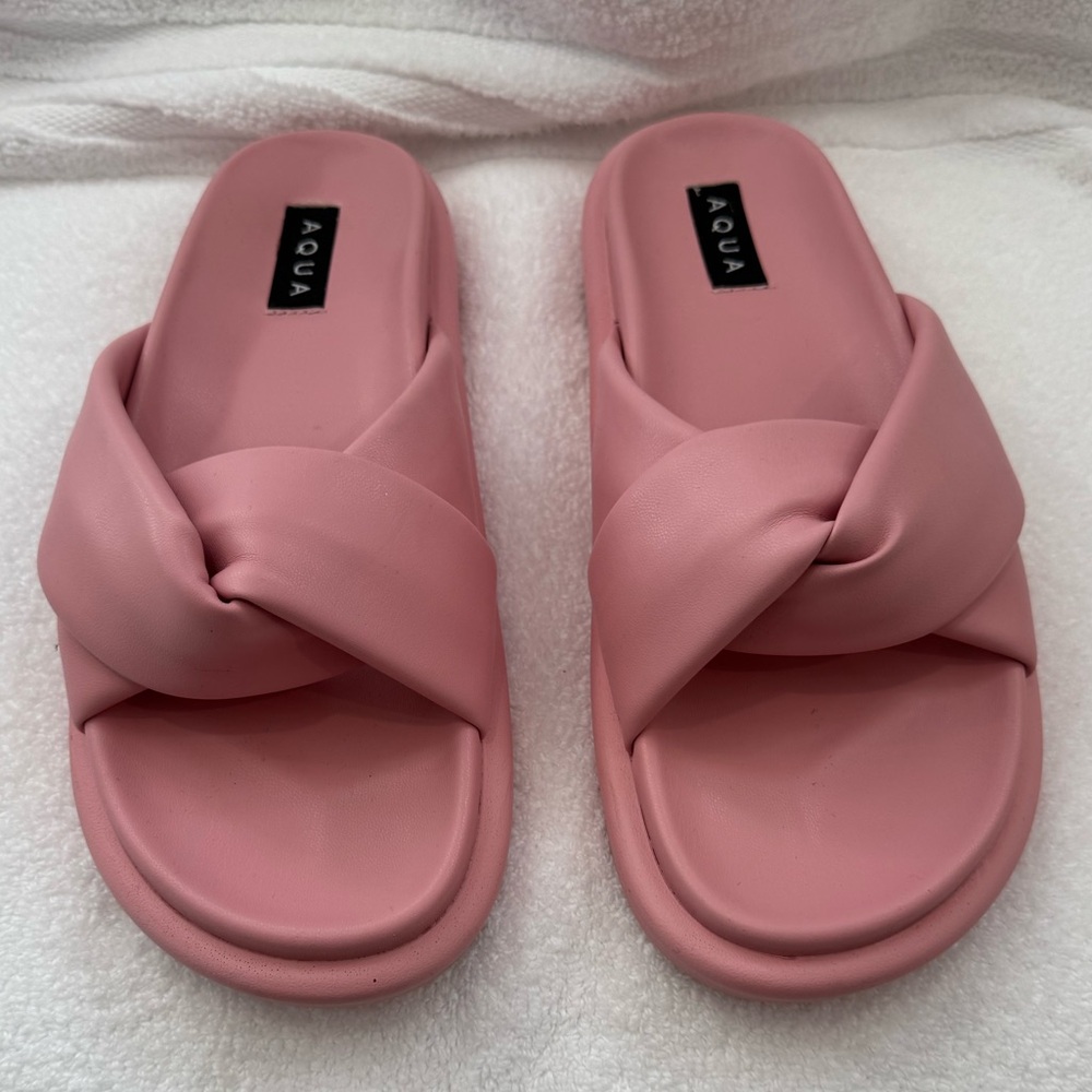 AQUA by Bloomingdale’s slides.